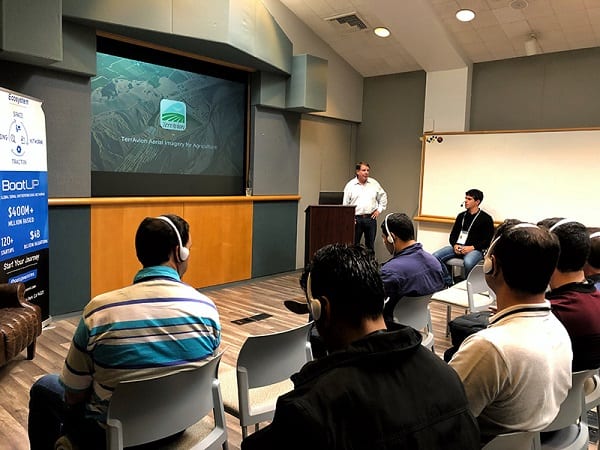 Companies executives watch a presentation