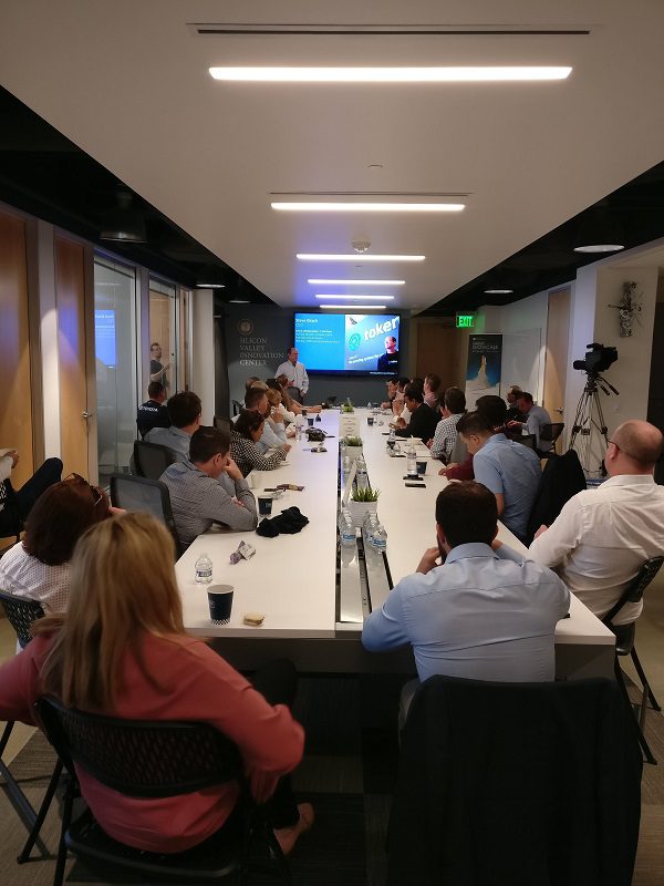  Image of Token speaker during a presentation at SVIC